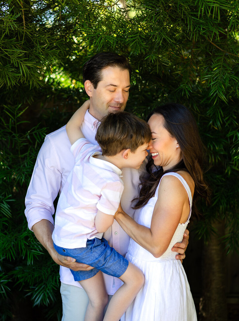 Parents holding young son close and smiling during outdoor session — Bay Area Photographer Services - Ellobelle Photography Family Photographer