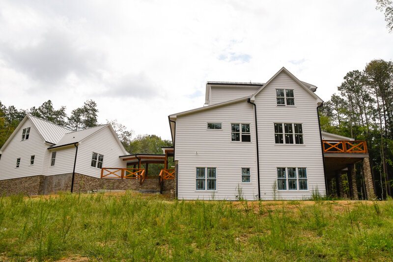 Explore stunning timberframe custom homes built by Ryan Noble Construction. Featuring exposed wooden beams, vaulted ceilings, and rustic charm, each home is a perfect blend of craftsmanship and natural beauty. Discover how timberframe construction adds warmth and elegance to your dream home