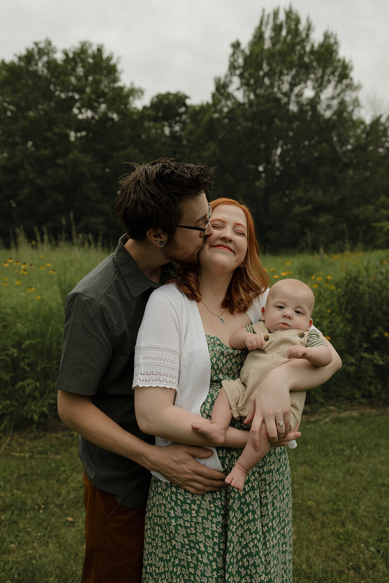 family walking through grass