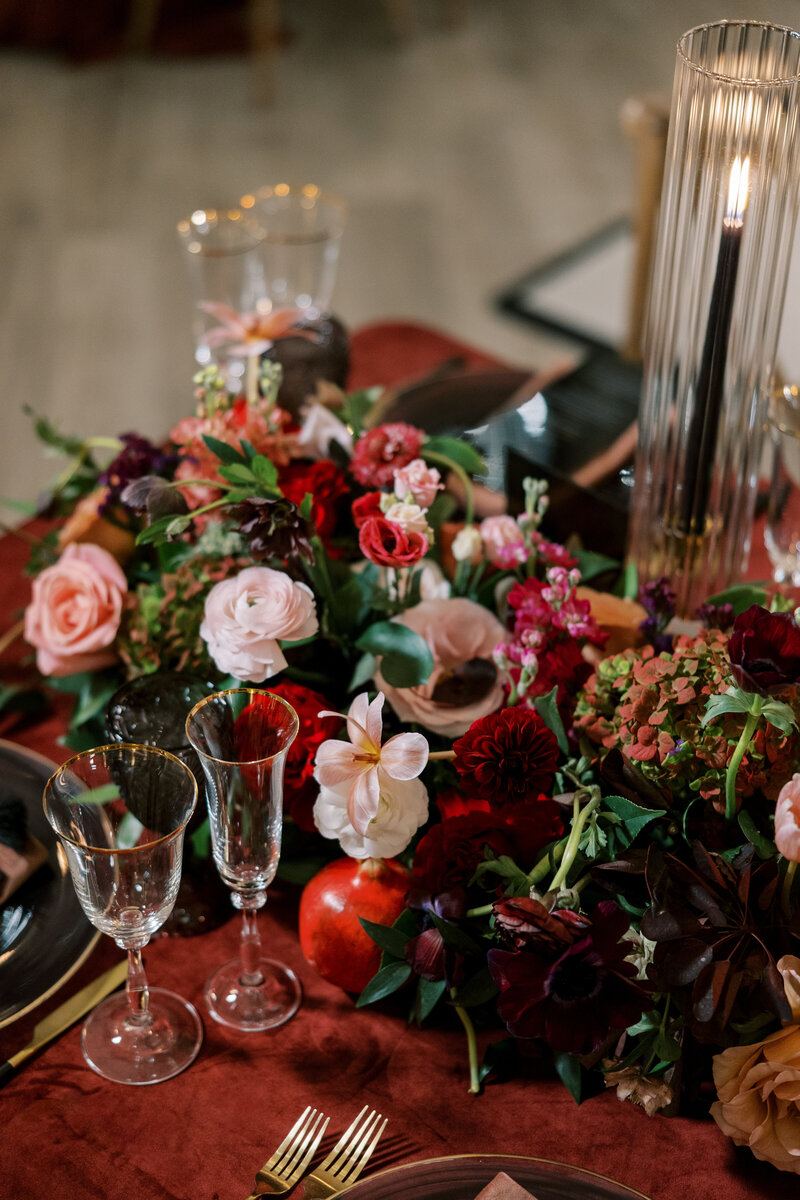 Floral centerpiece with pink and blue flowers