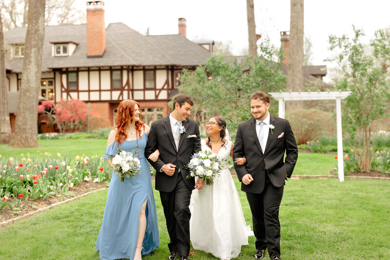 Maryland wedding photographer takes photos of a wedding party in front of Gramercy mansion