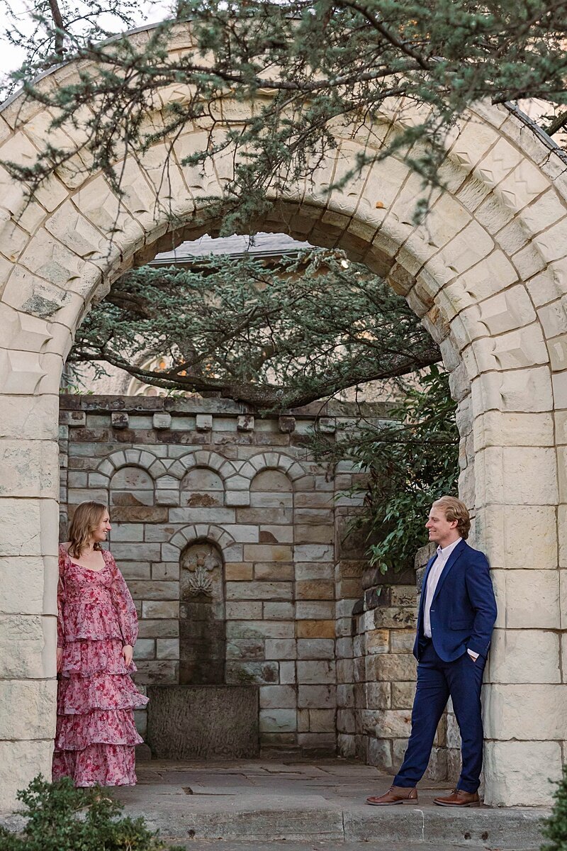 engagement-session-national-cathedral-washington-dc-couple-standing-in-front-of-national-cathedral