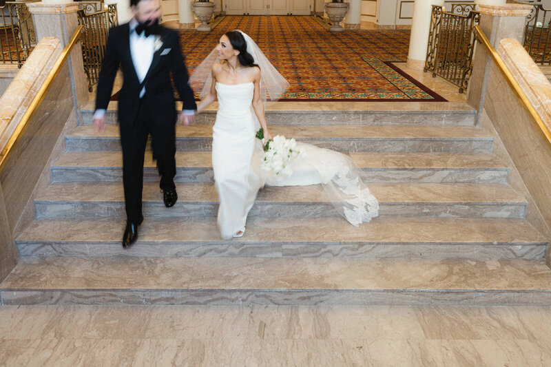wedding couples being photographed at the hotel vancouver