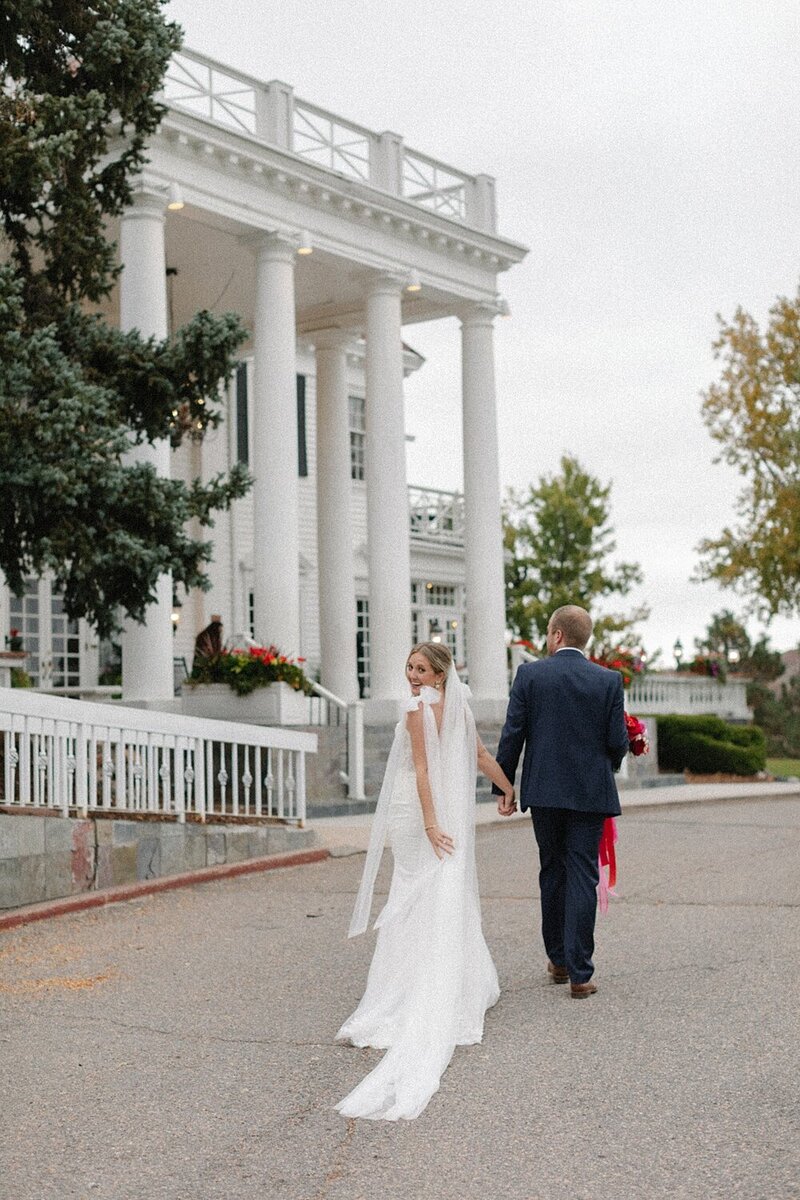 Colorado wedding couple at the base of a mountain
