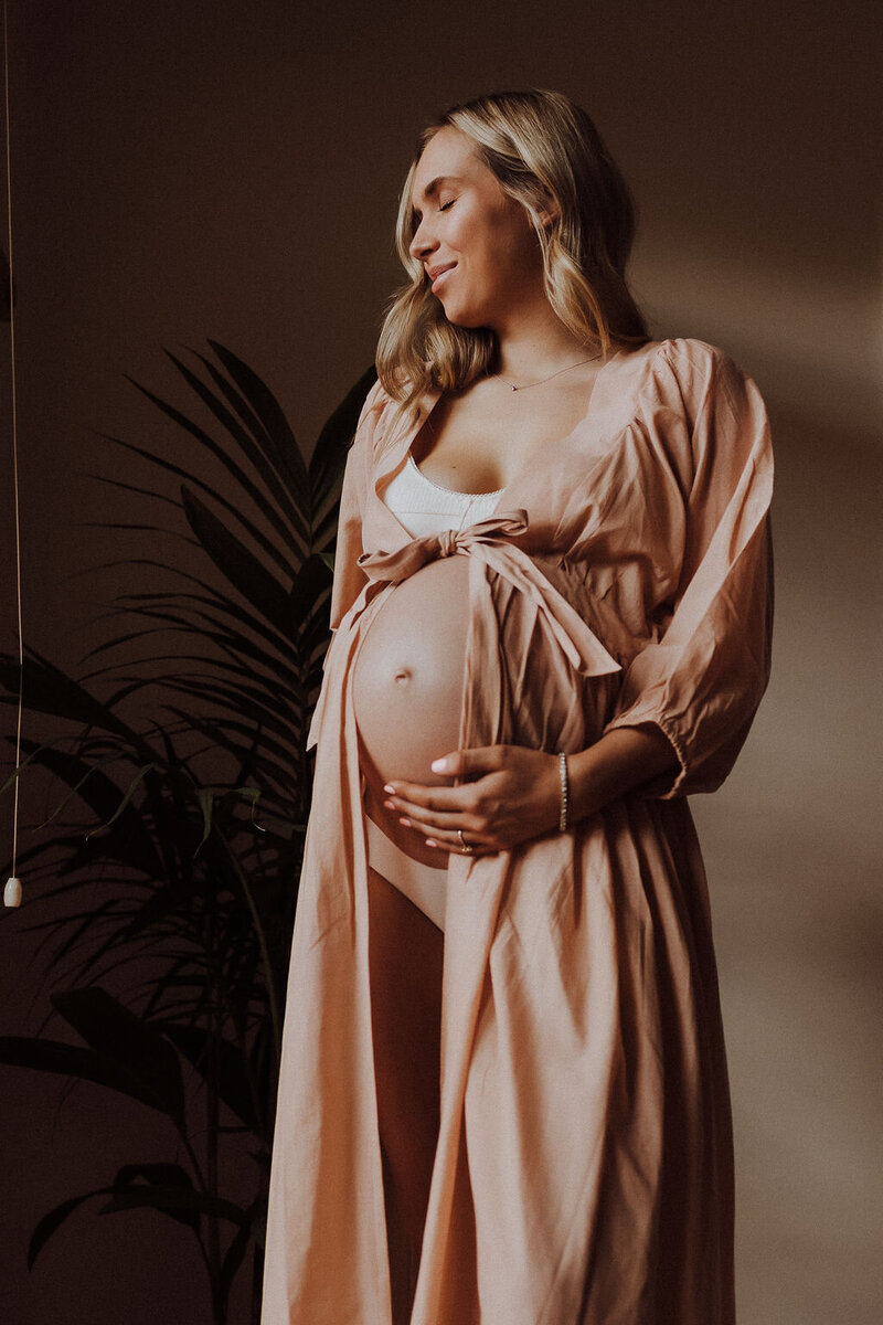 Pregnant lady in pink robe