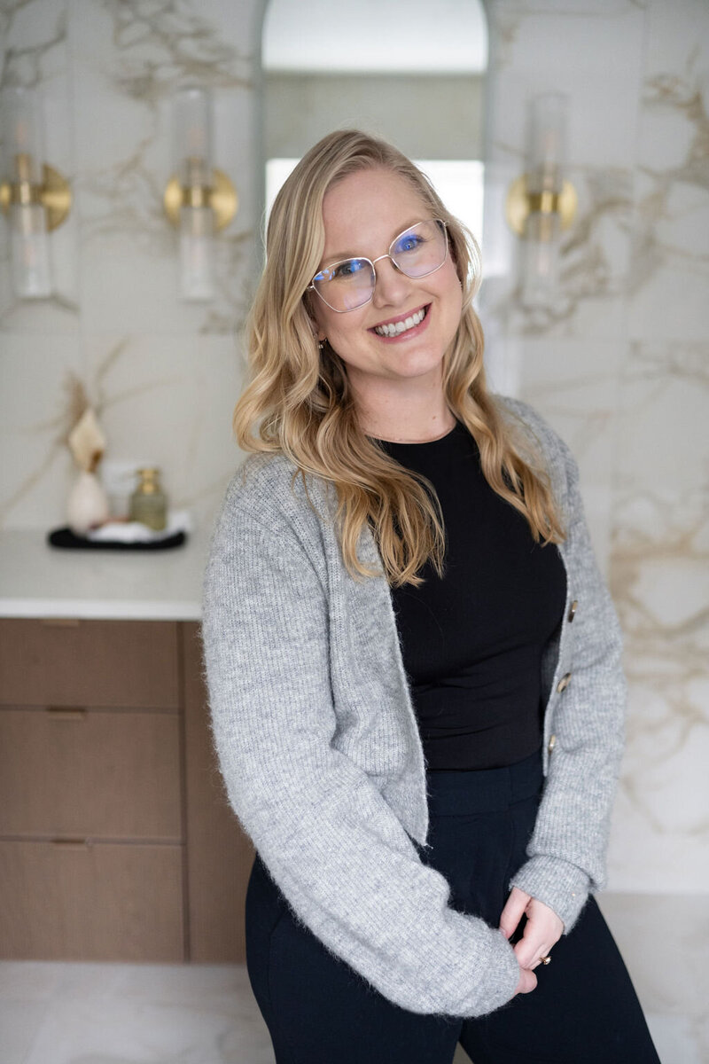 Interior Designer Rebecca Foster in a modern designed bathroom