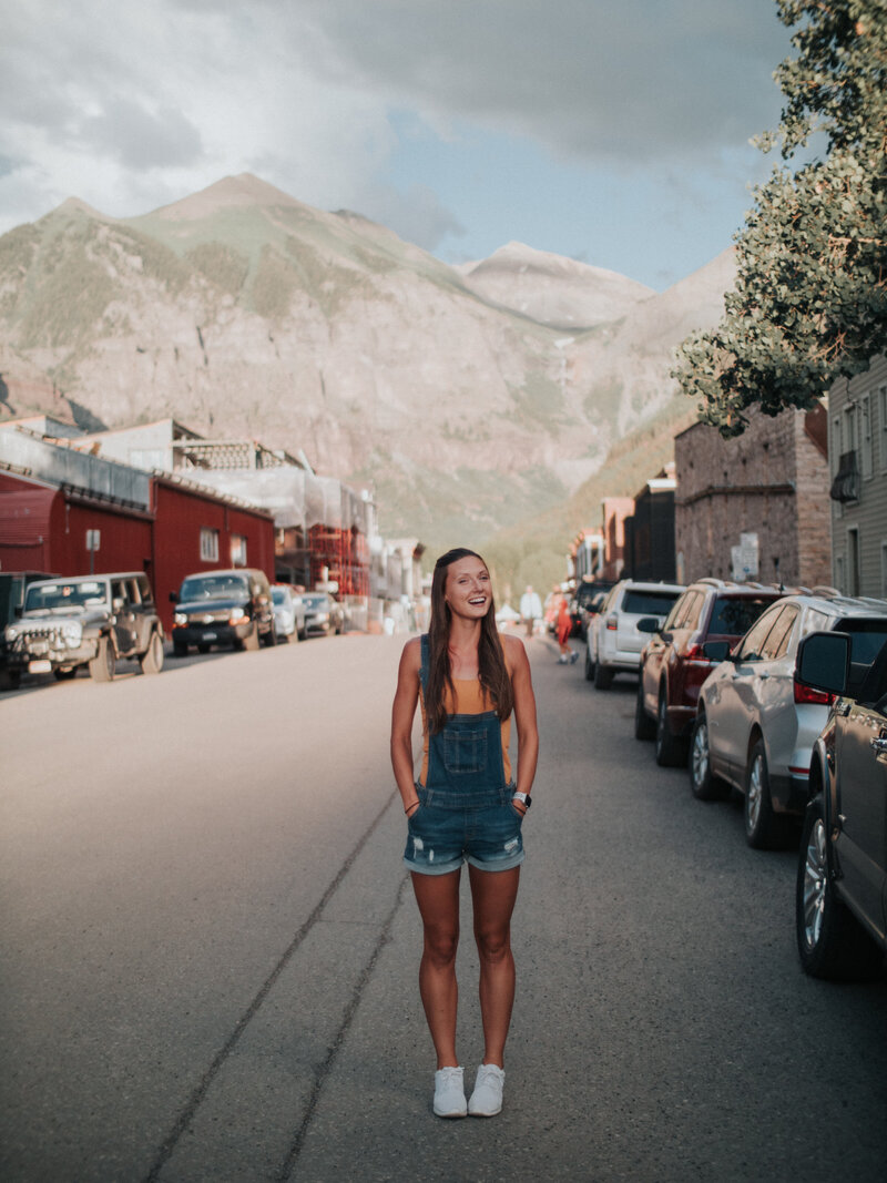 woman walking down street