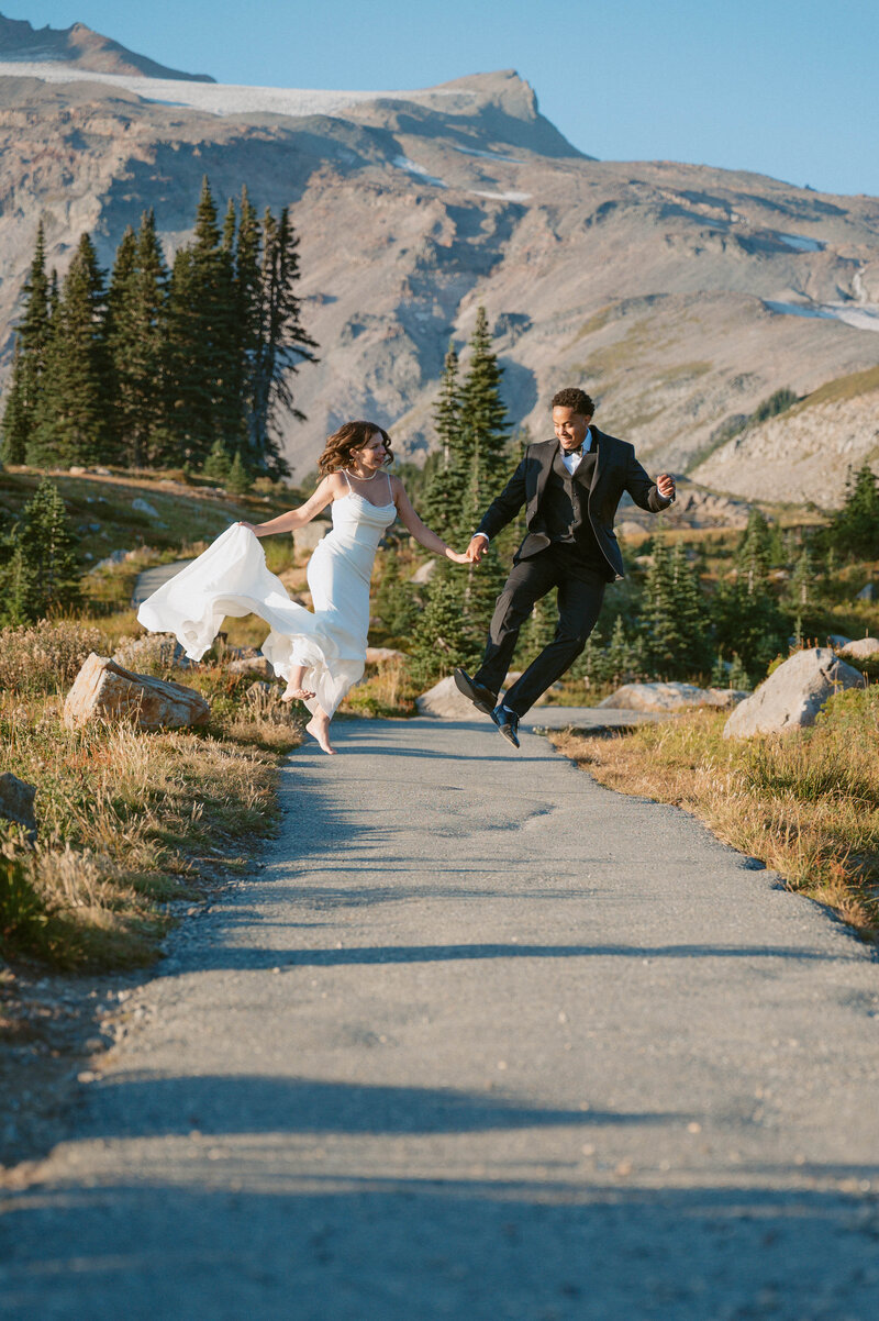 elopement couple hold their dog in their arms