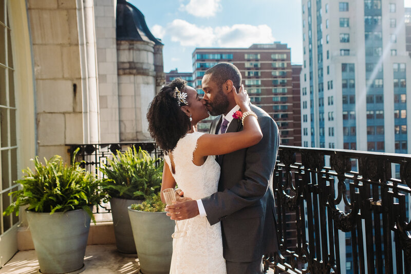 bride and groom standing in Philadelphia musuem