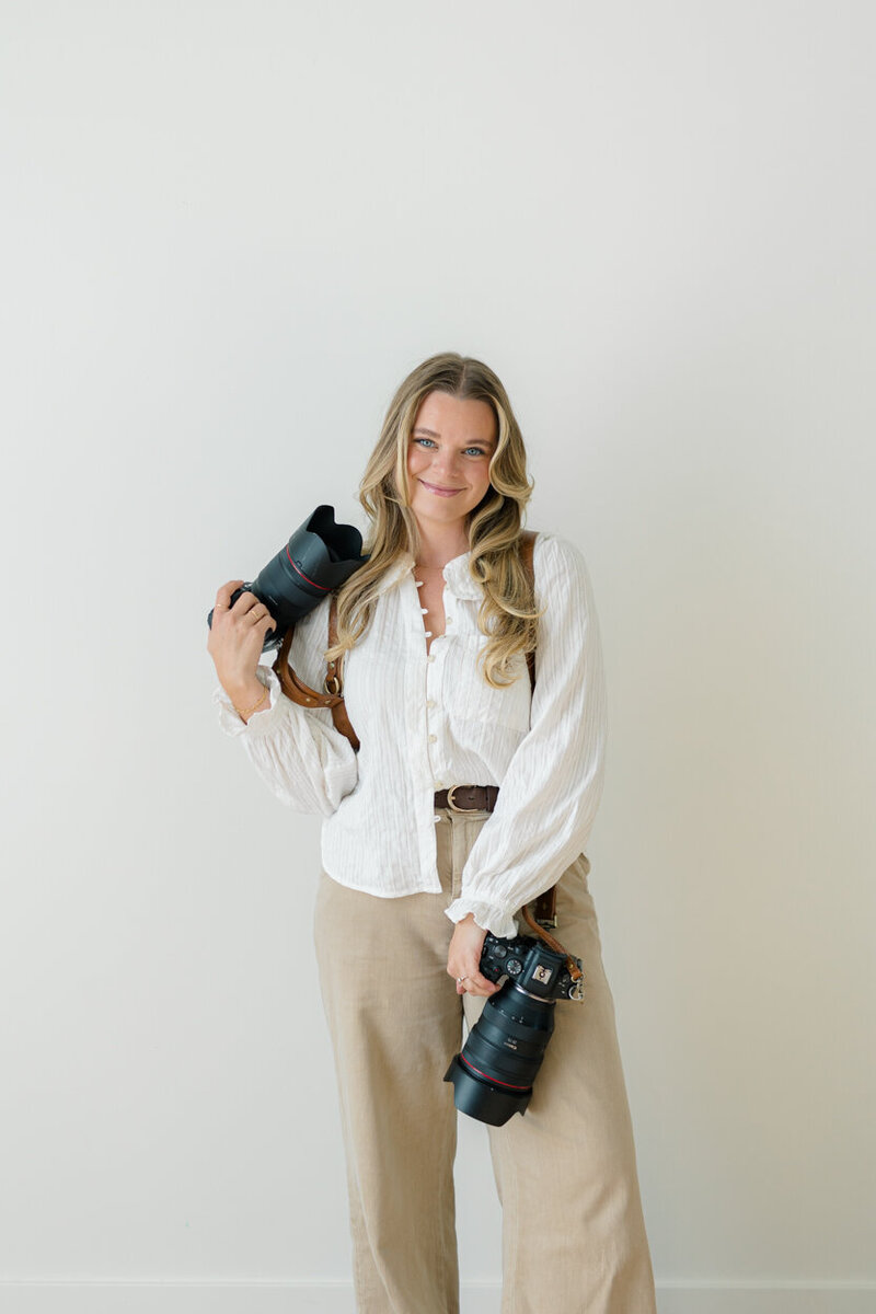 Amanda Shupe holding camera
