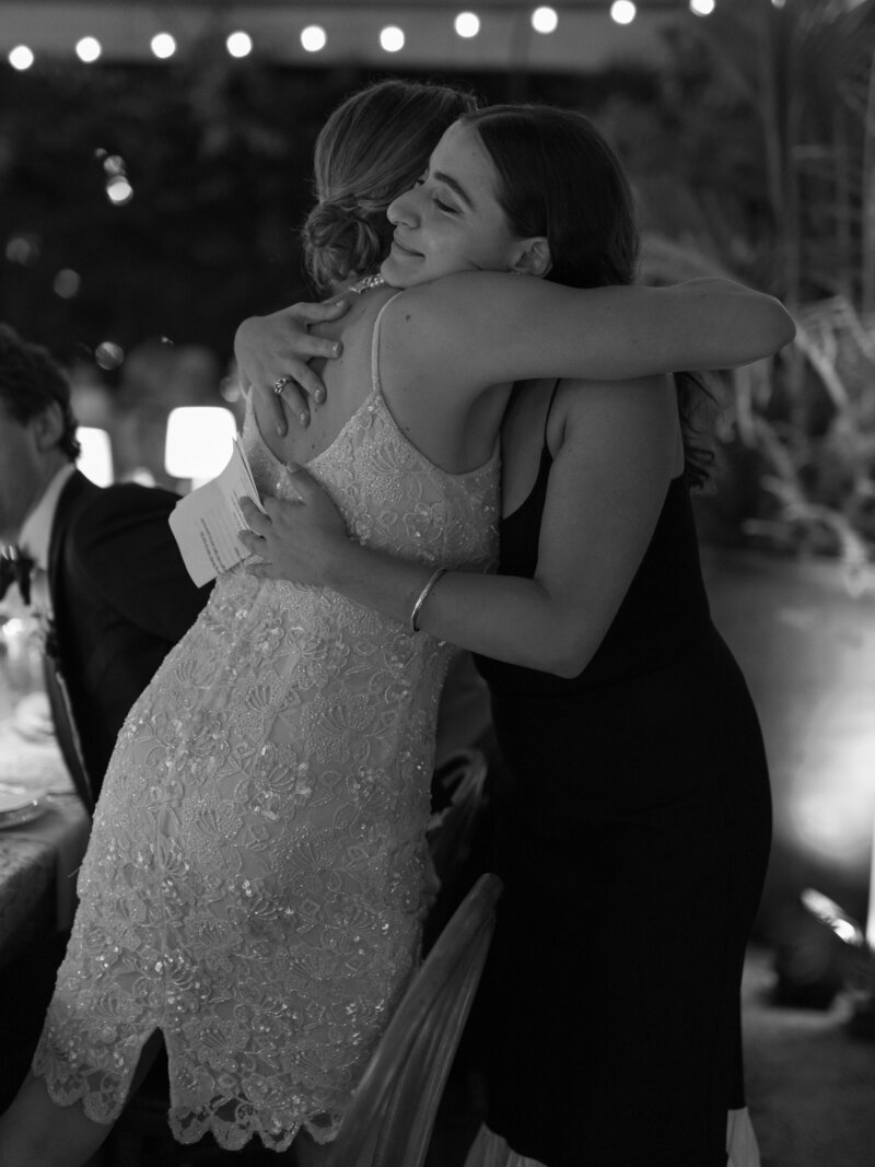 Bride and groom have their first dance at their wedding reception