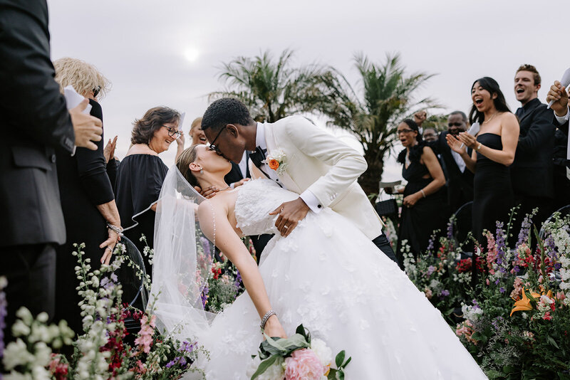 Recessional Dip Kiss by Zhaun Frias Photography