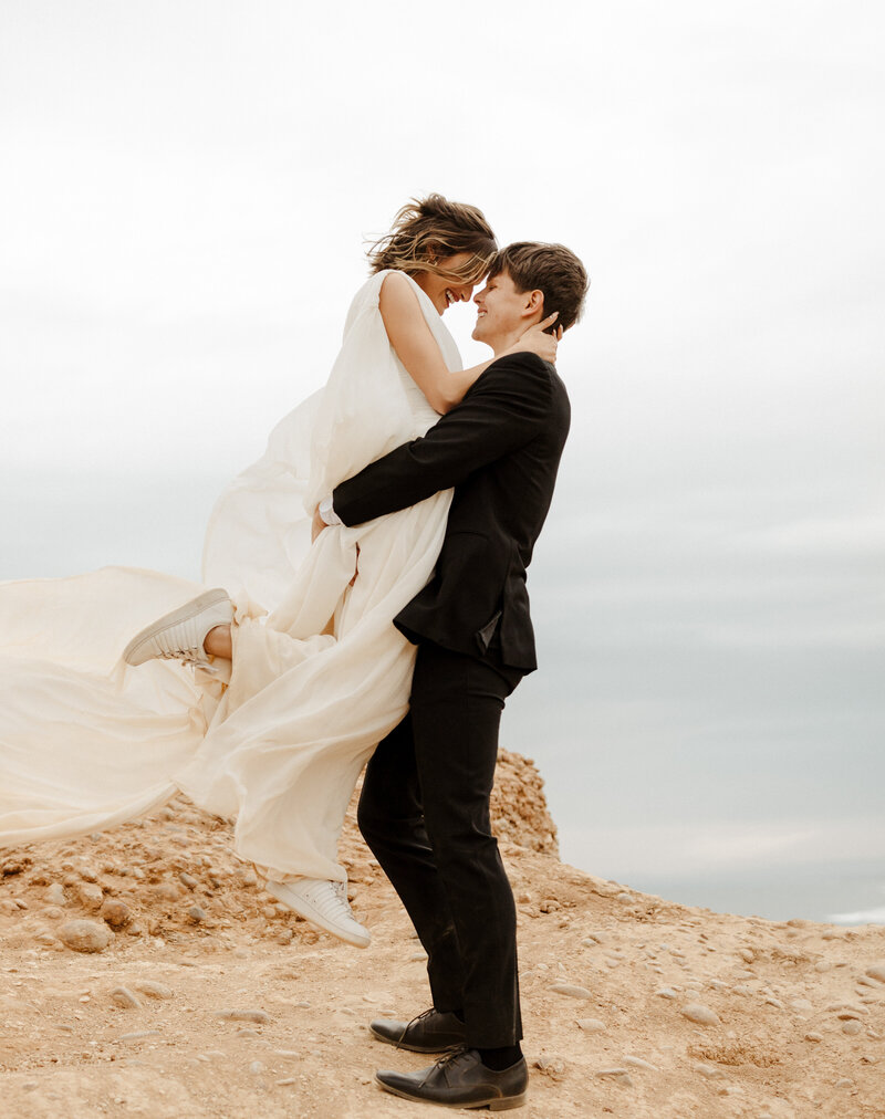 bride and groom at cliffside Southern California elopement