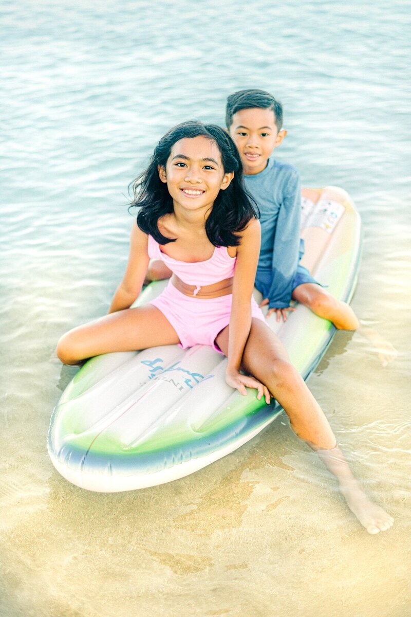 Maui float beach photo session surfboard