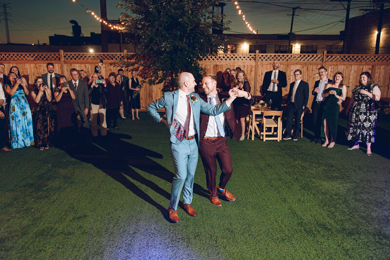 A queer couple share their first dance at Bridge 410 in Chicago