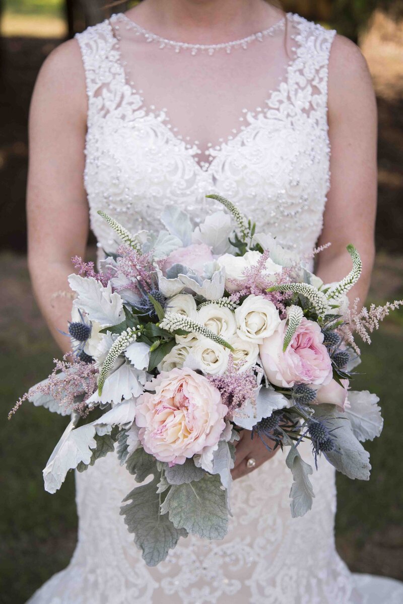 Bride holding wedding bouquet