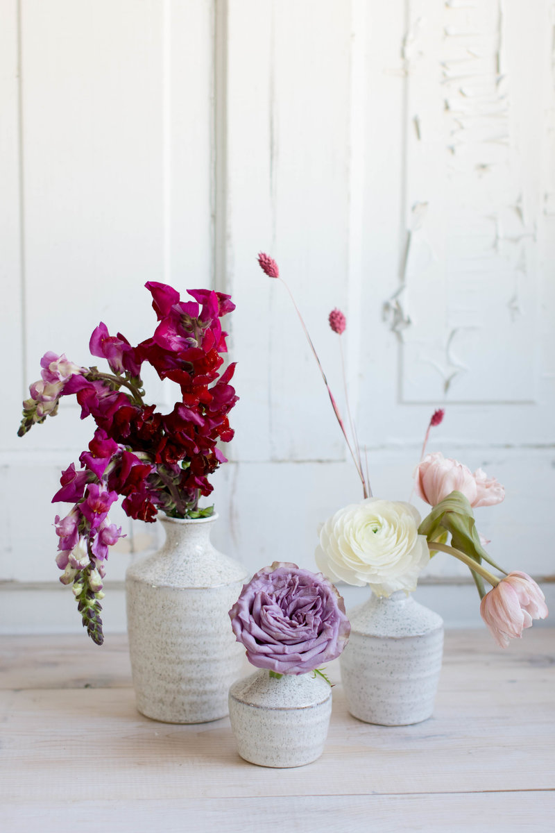 wine-colored-budvases-of-flowers-5