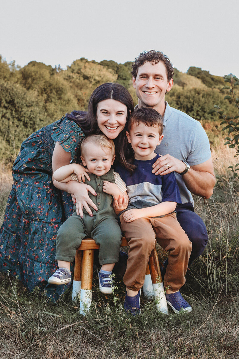Family portrait taken in field near Norfolk, Massachusetts