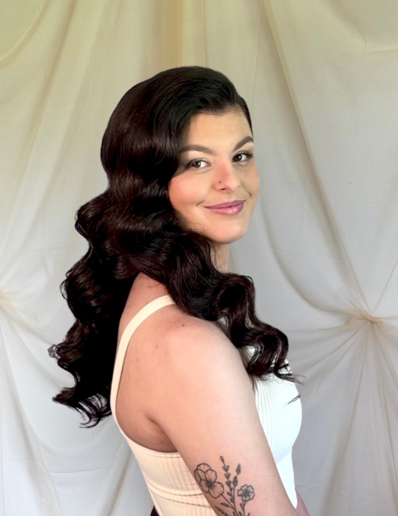 Hollywood waves and airbrushed makeup