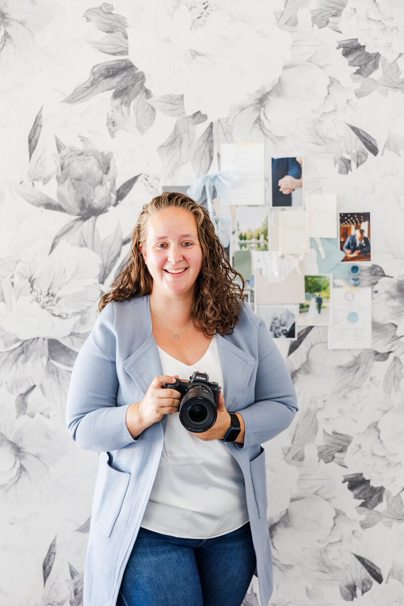 Owner and creator of Silverbridge & Co. Erica with her Nikon DSLR Camera