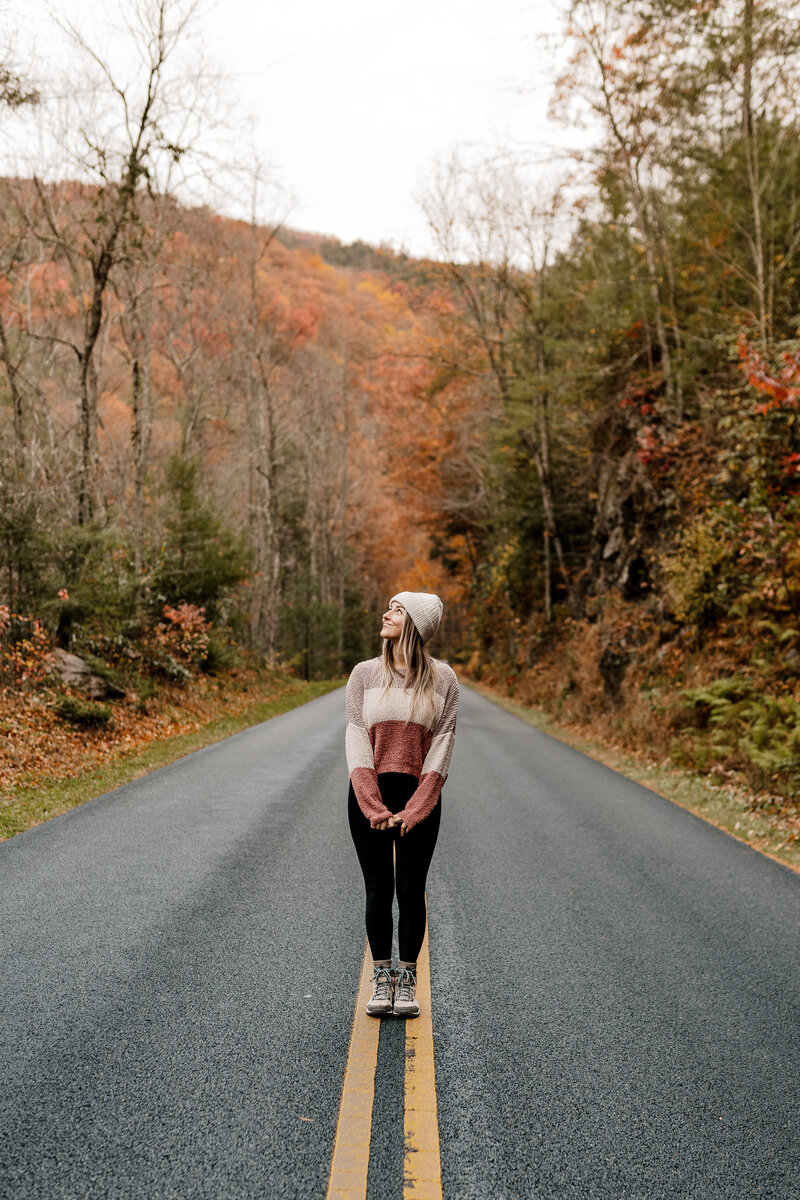 woman standing in road posing