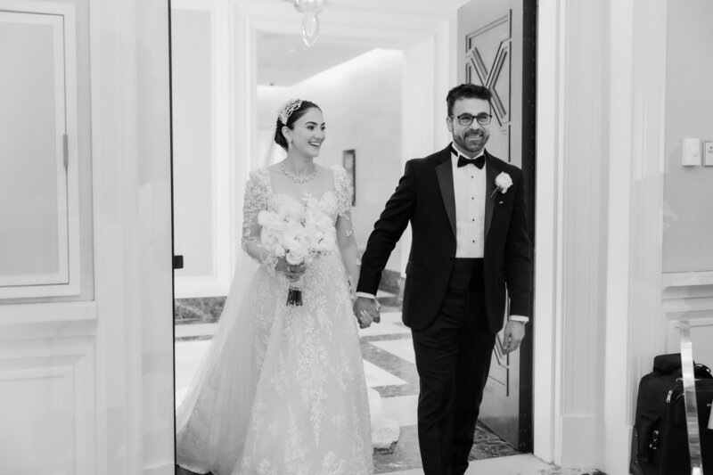 bride and groom seeing their reception room at a wedding at the four seasons Orlando by Florida wedding photographer.