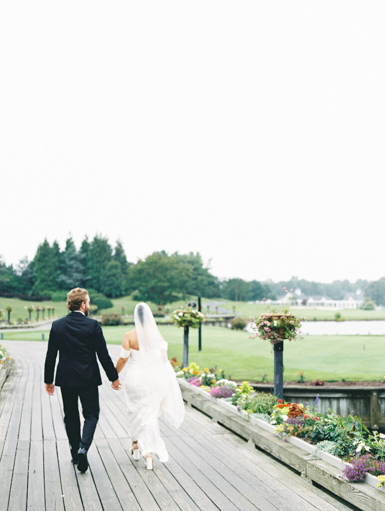 couple walking together taken on film by dc film wedding photographer nicole Simensky