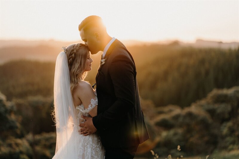 A sunset image of a couple during a wedding photoshoot