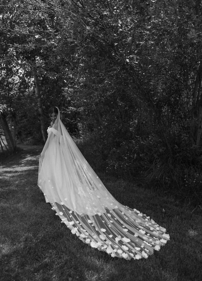 a bride showing of her long veil