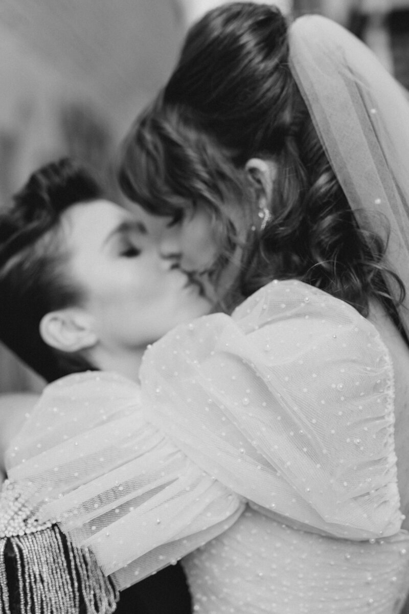 LGBTQ+ couple kissing