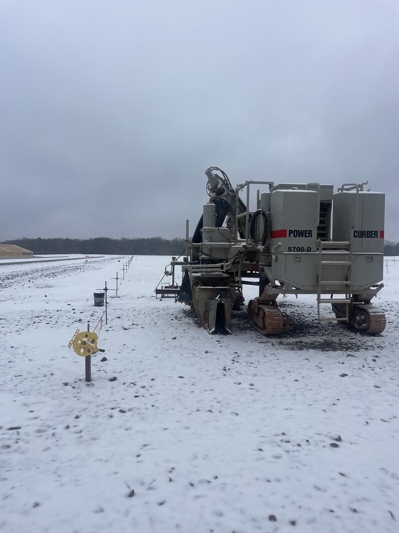 Power curber in the snow