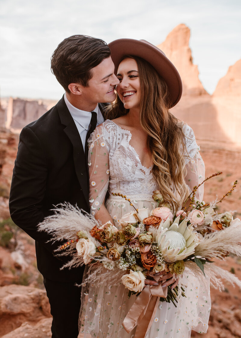 Couple elopes at Arches National Park in Moab, Utah with Colorado elopement photographer Alpine Vows