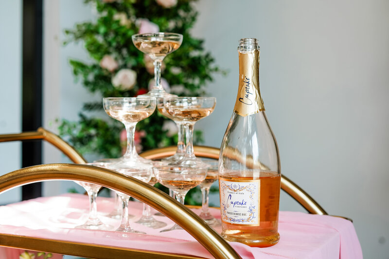 A champagne tower on a cart