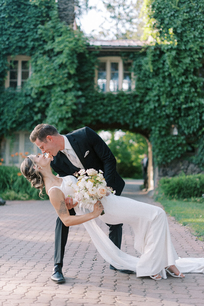 Bride and groom walk up memorial steps at their DC wedding