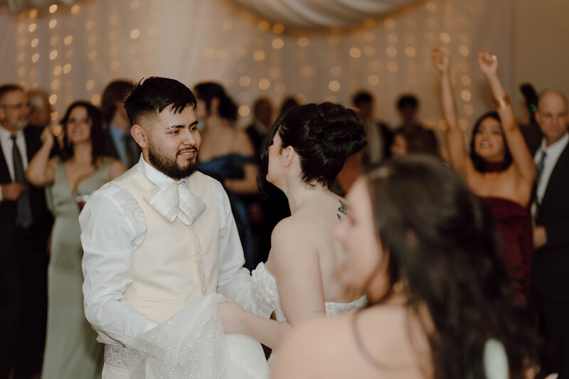 Candid photo of bride and Groom during open dance