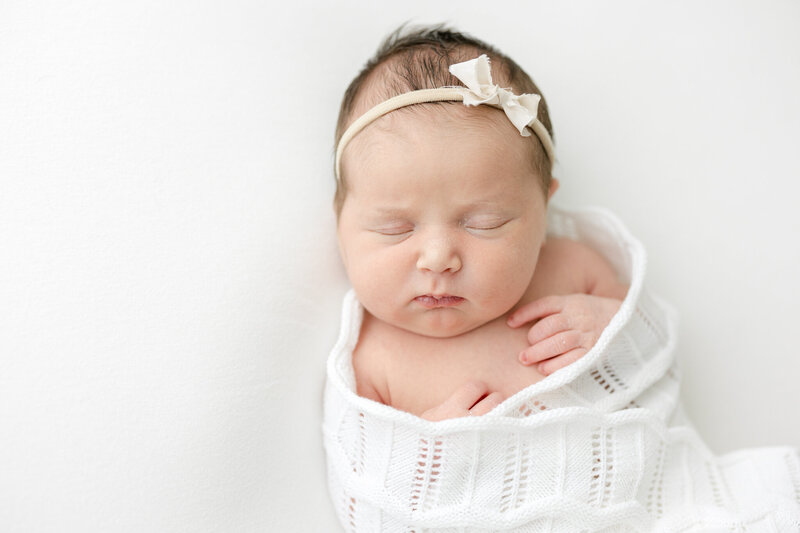 Portrait of newborn baby napping