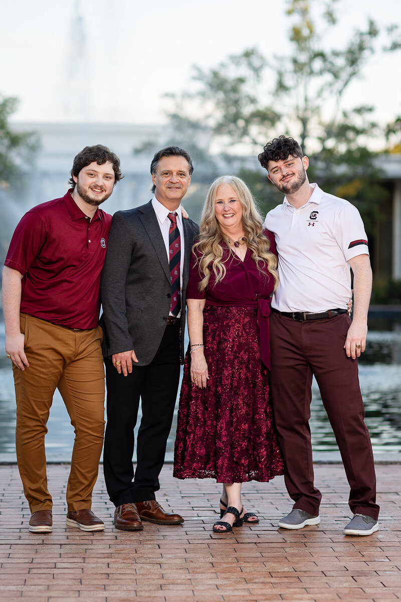 A family posing for family portraits in a park in downtown, Columbia, South Carolina