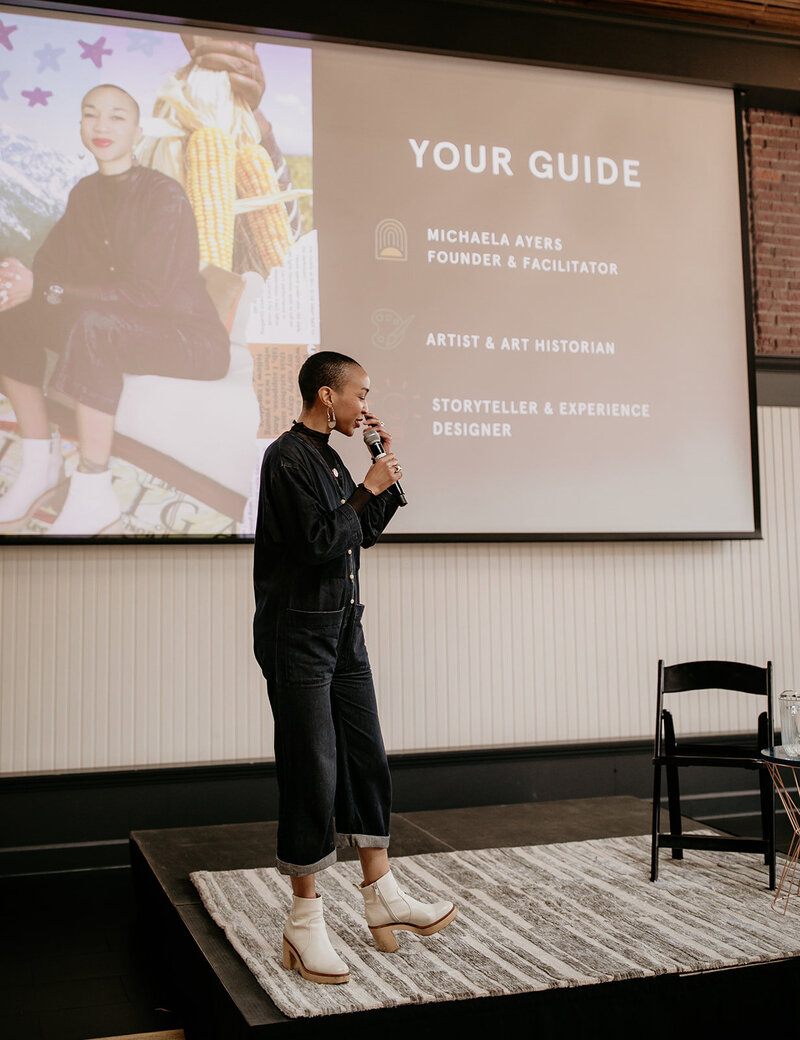 Image of Michaela Ayers speaking at a small business conference in Portland, Oregon