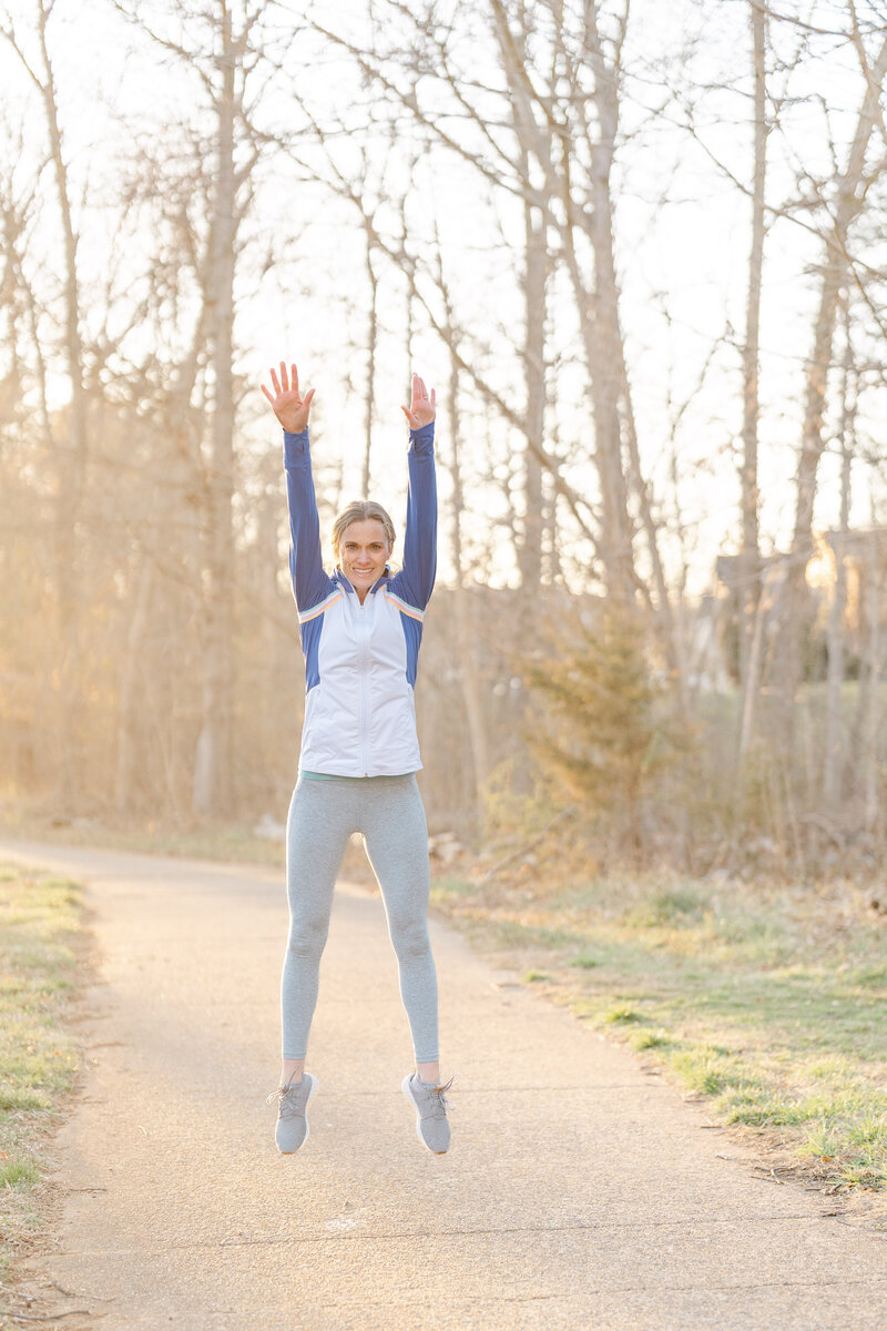 Woman doing high jump during Chantilly, Virginia branding session