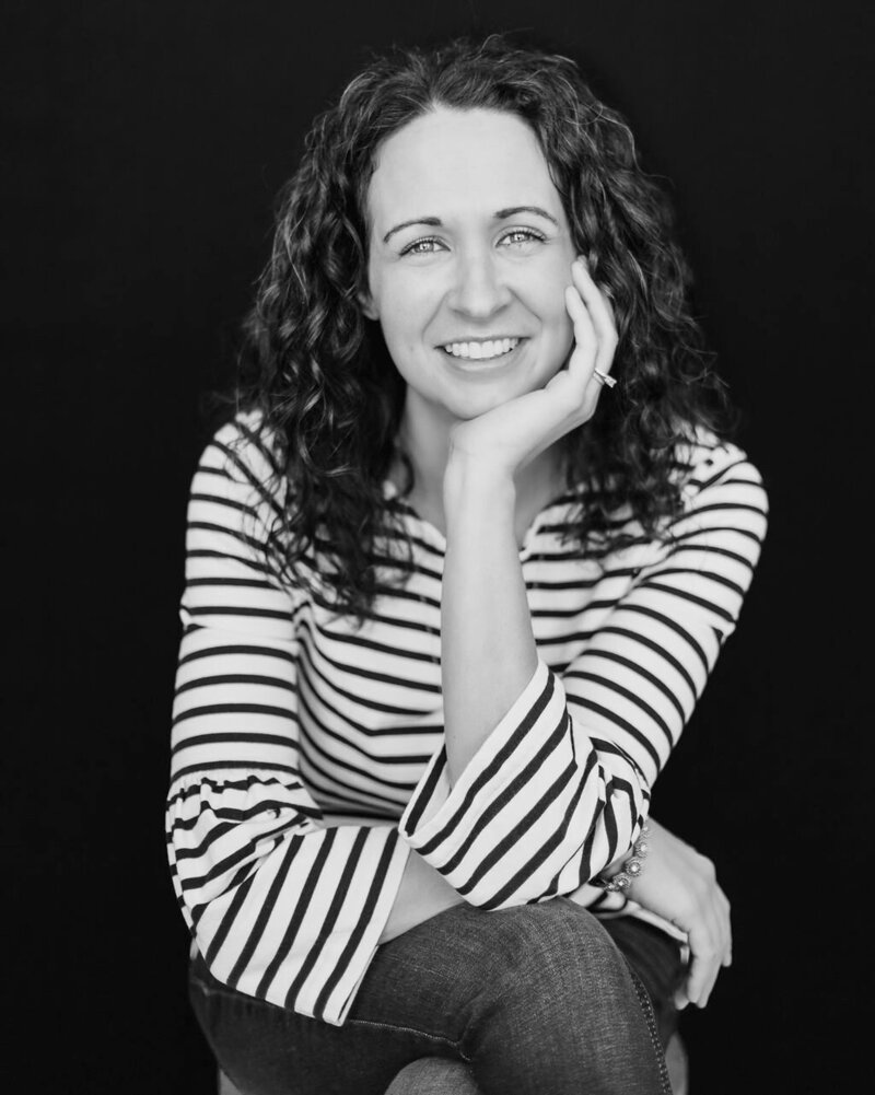 Black and white headshot of Abby Willaert, old home realtor in the Twin Cities