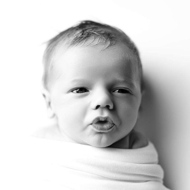 Capturing sweet and silly—one puckered face at a time.