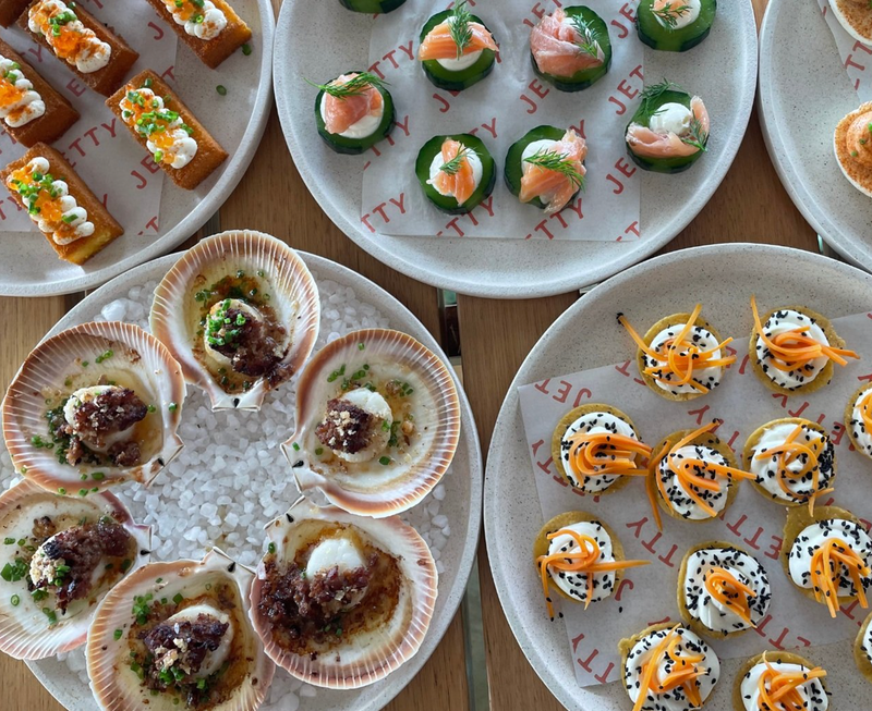 Plates of scallop and salmon canapes at Jetty Bar in Western Australia