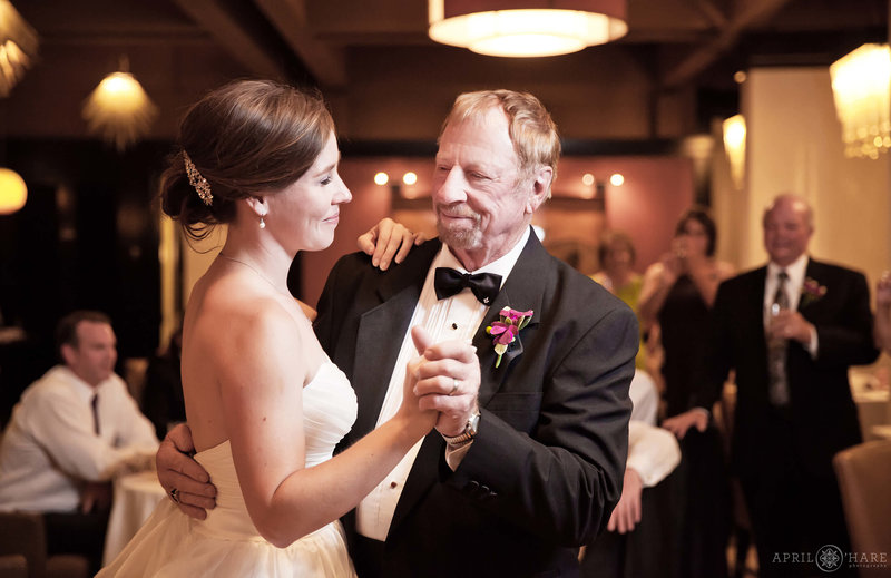Bride dances with her dad at her Sheraton Steamboat Resort Wedding Reception
