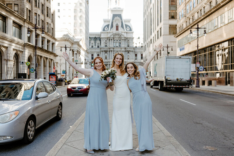 bride and bridesmaids at City Hall elopement