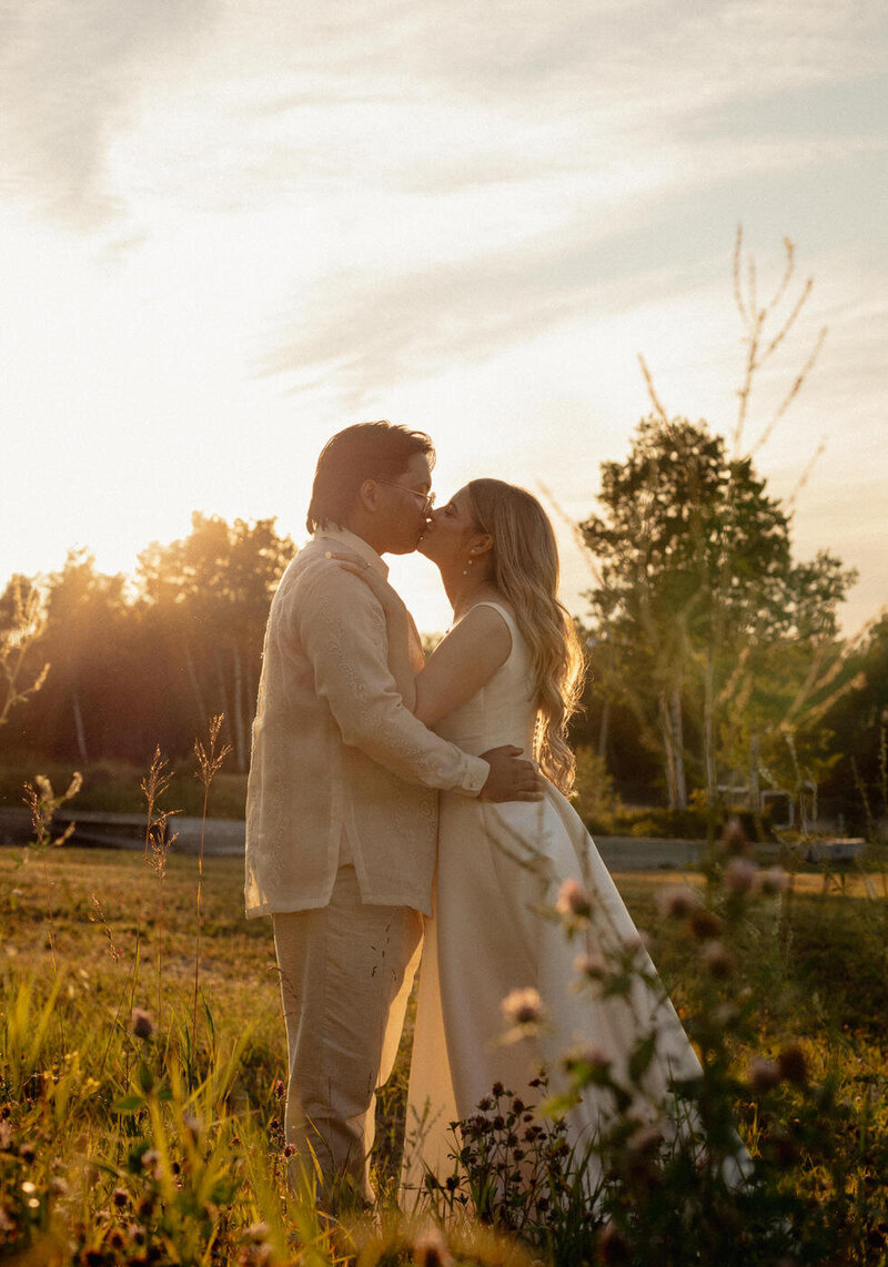 Couple kissing in the sunset in Manitoba 