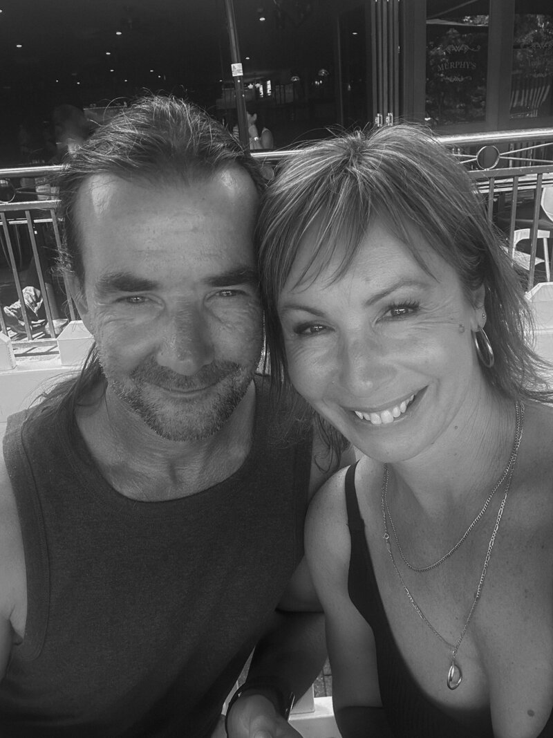 Black and white photo of the male and female owners of Love Building Co