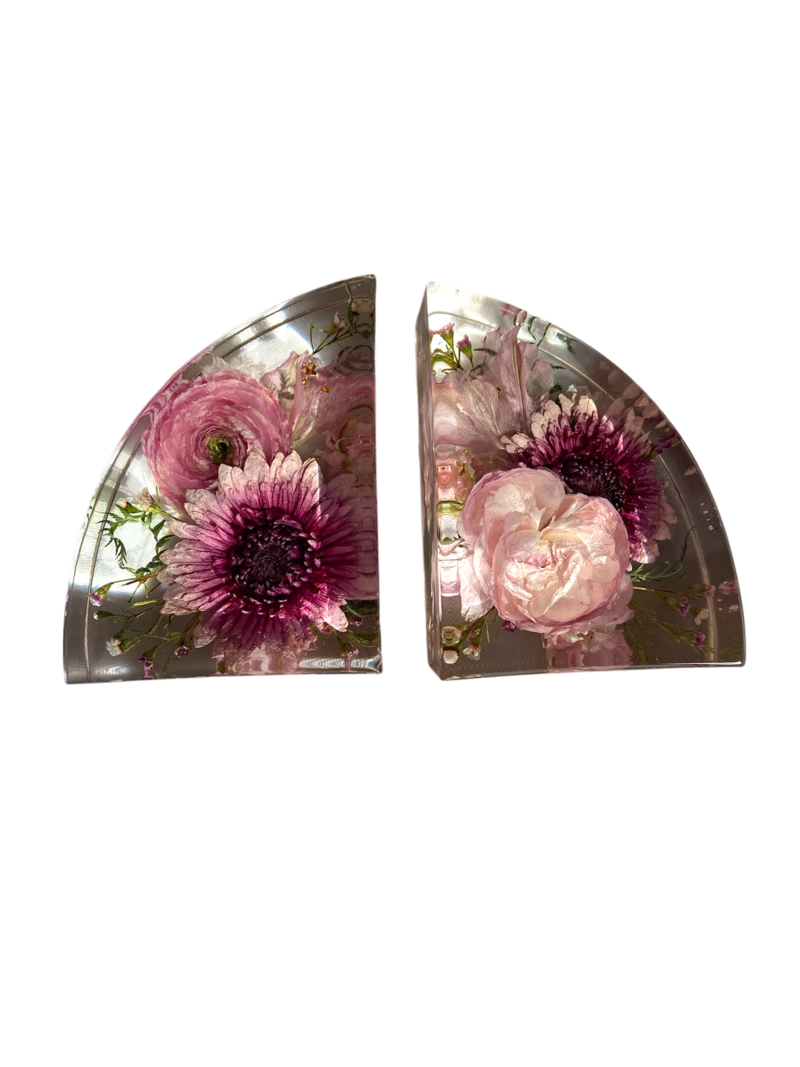 large resin frame with brides bright and colorful wedding flowers preserved inside