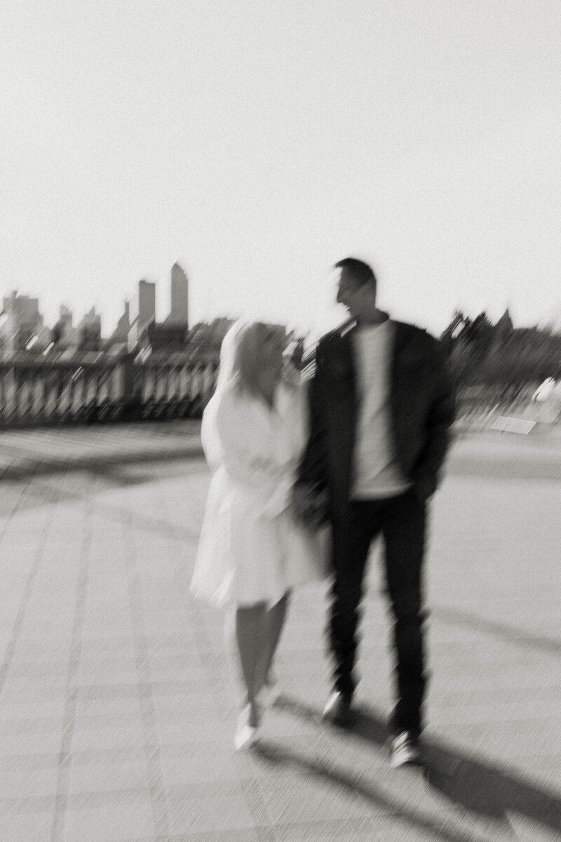 blurry engagement photos in the city