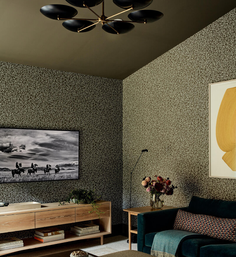 Boston interior designer designs a Vermont new construction home with moody wallpaper, bright art, and a comfortable family room for a Stowe weekend retreat.