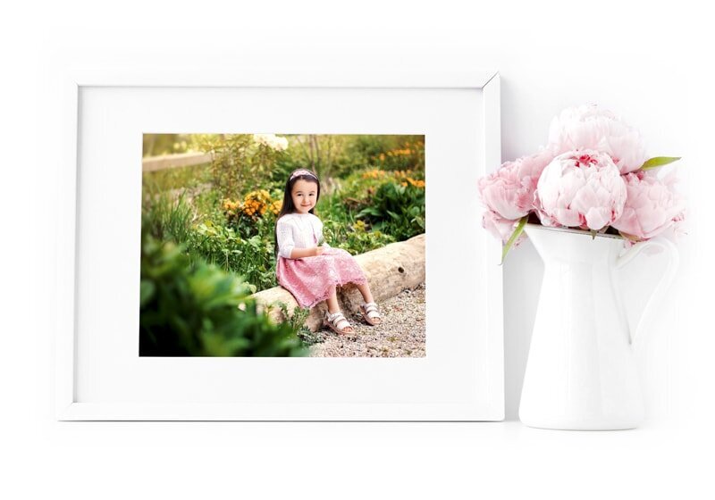 Toddler girl wearing a pink dress during Burnaby park photoshoot by Vancouver Family Photographer Amber Theresa Photography.